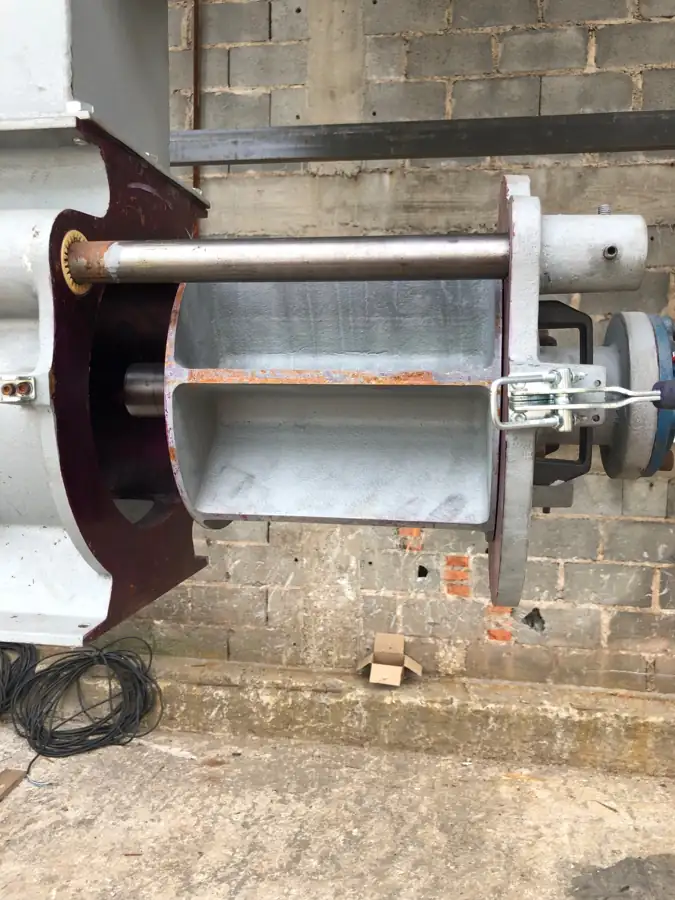 Open rotary airlock showing the rotor and internal access for inspection and maintenance